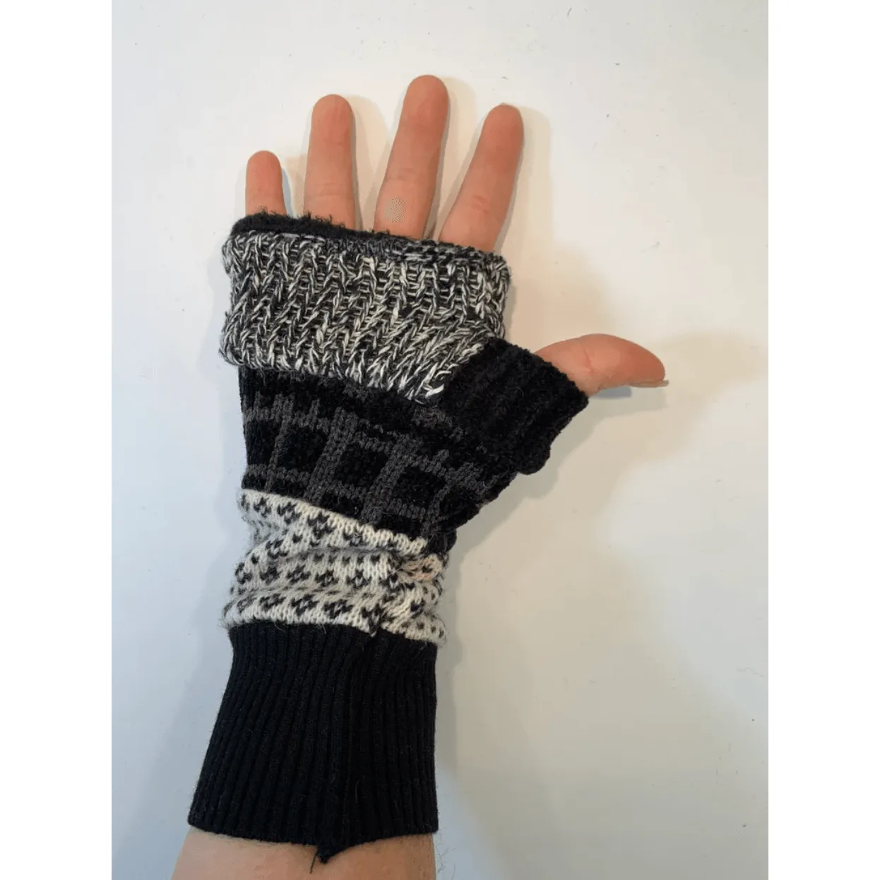 Black n white upcycled sweaters into fingerless patchwork gloves. Great for fun, school, texting, cashiers, wrist warmer,fingers free.