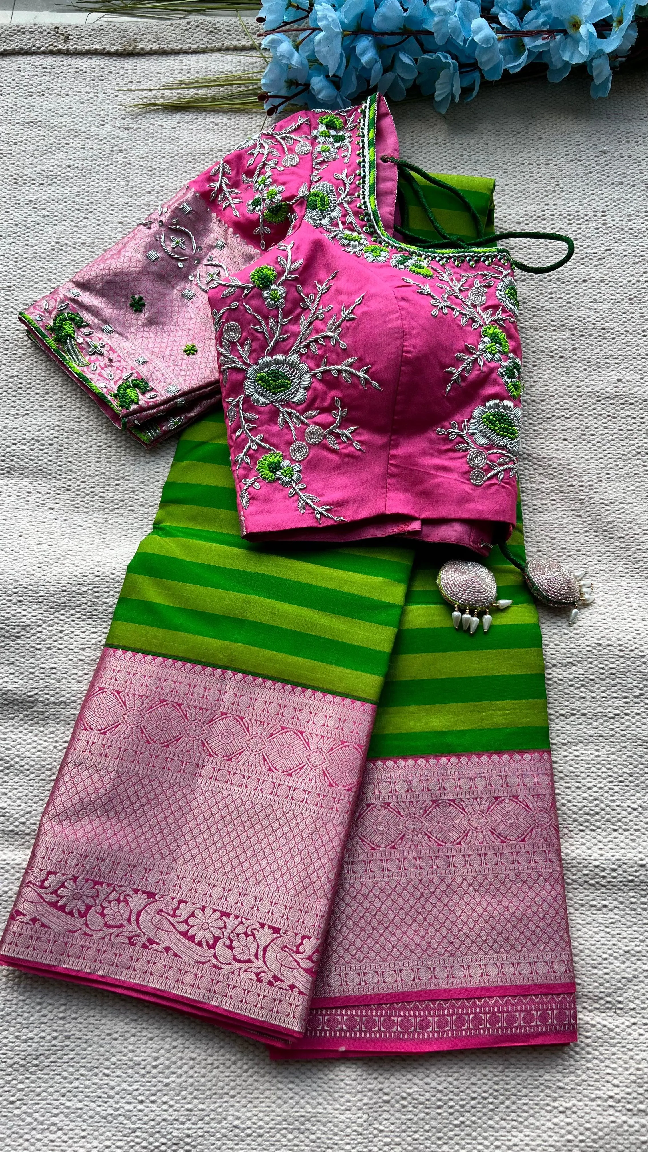 Green and pink kanchipuram silk saree with hand worked blouse