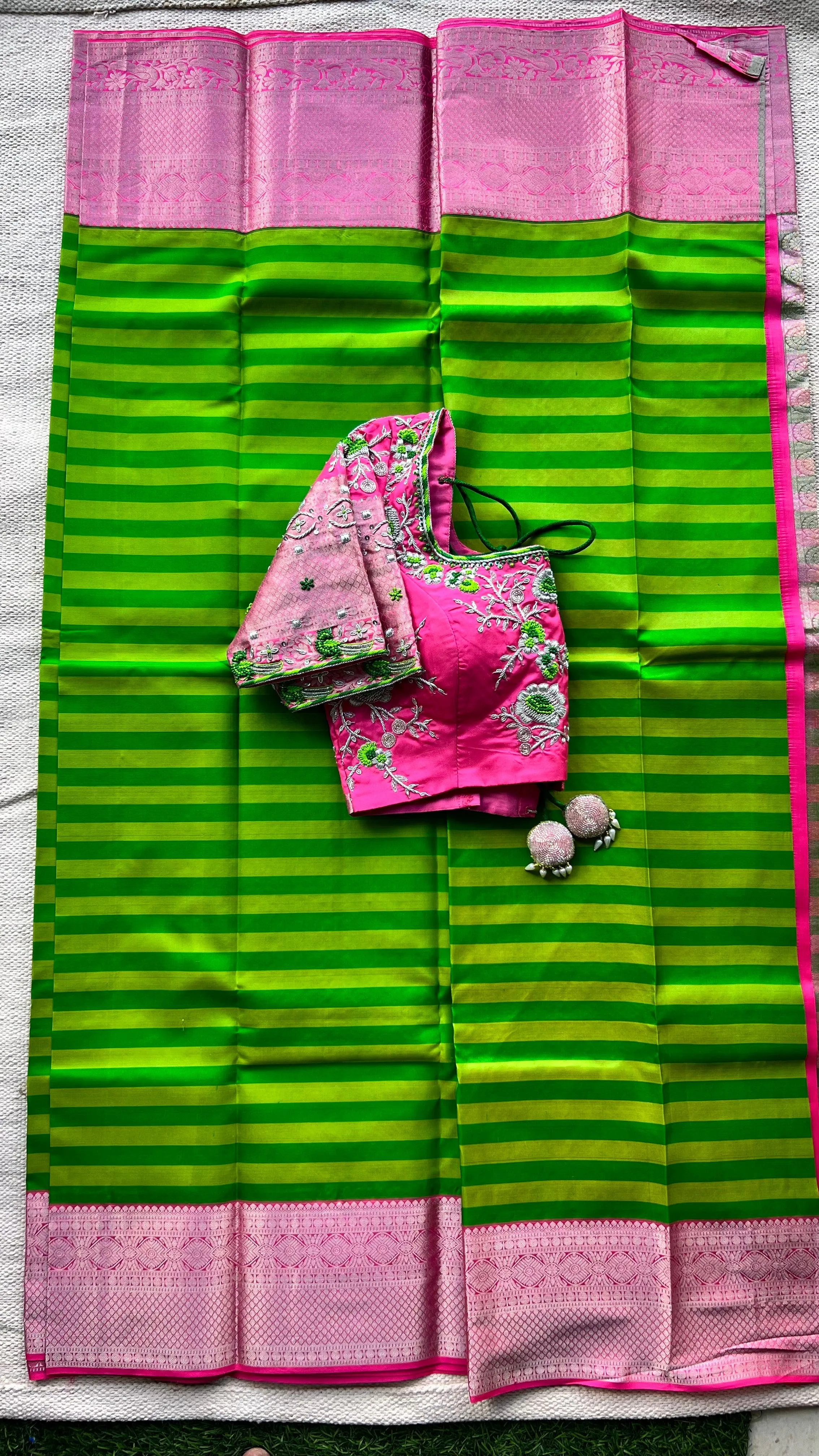 Green and pink kanchipuram silk saree with hand worked blouse