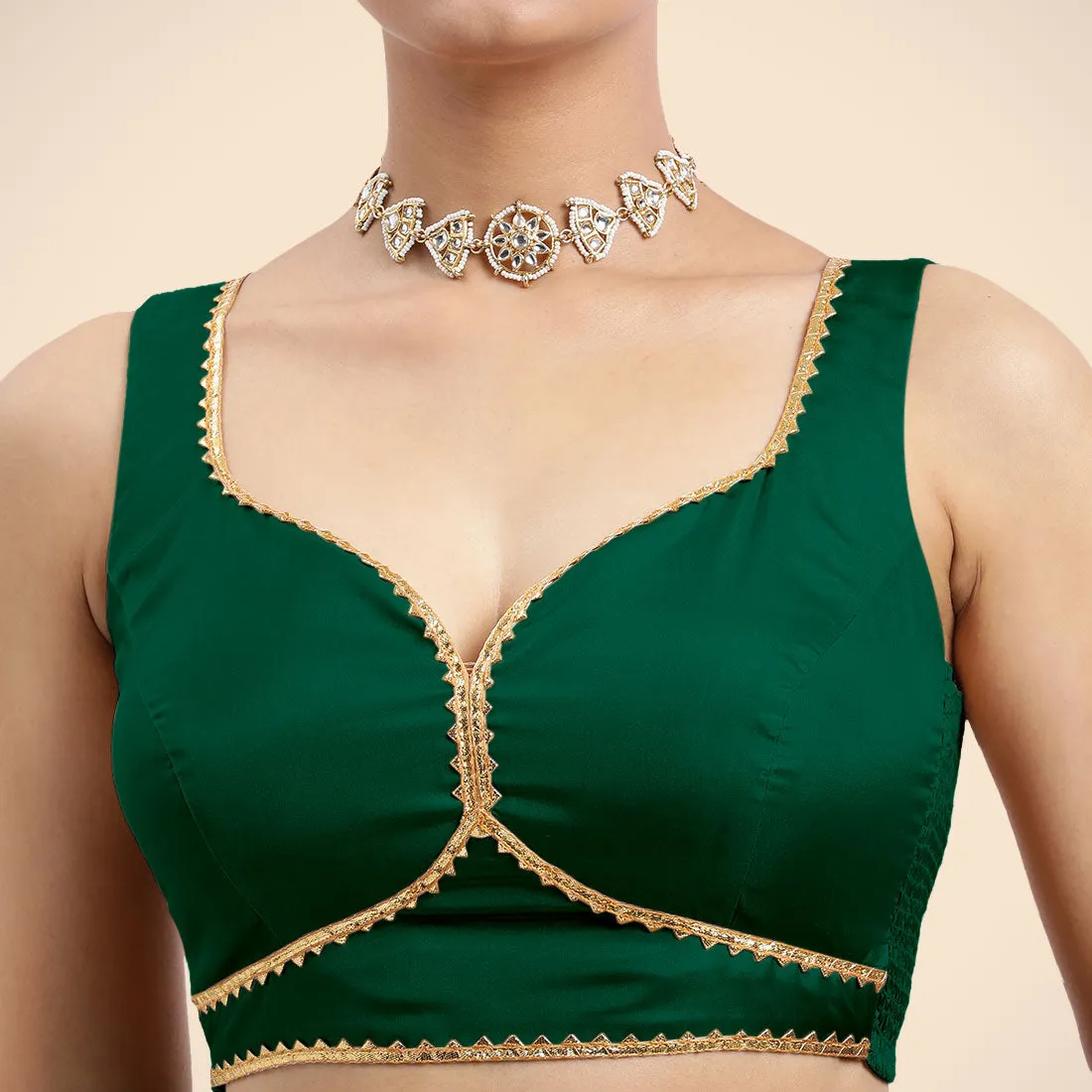 Ishika x Tyohaar | Bottle Green Sleeveless FlexiFit™ Saree Blouse with Beetle Leaf Neckline with Golden Gota Lace and Back Cut-out with Tie-Up